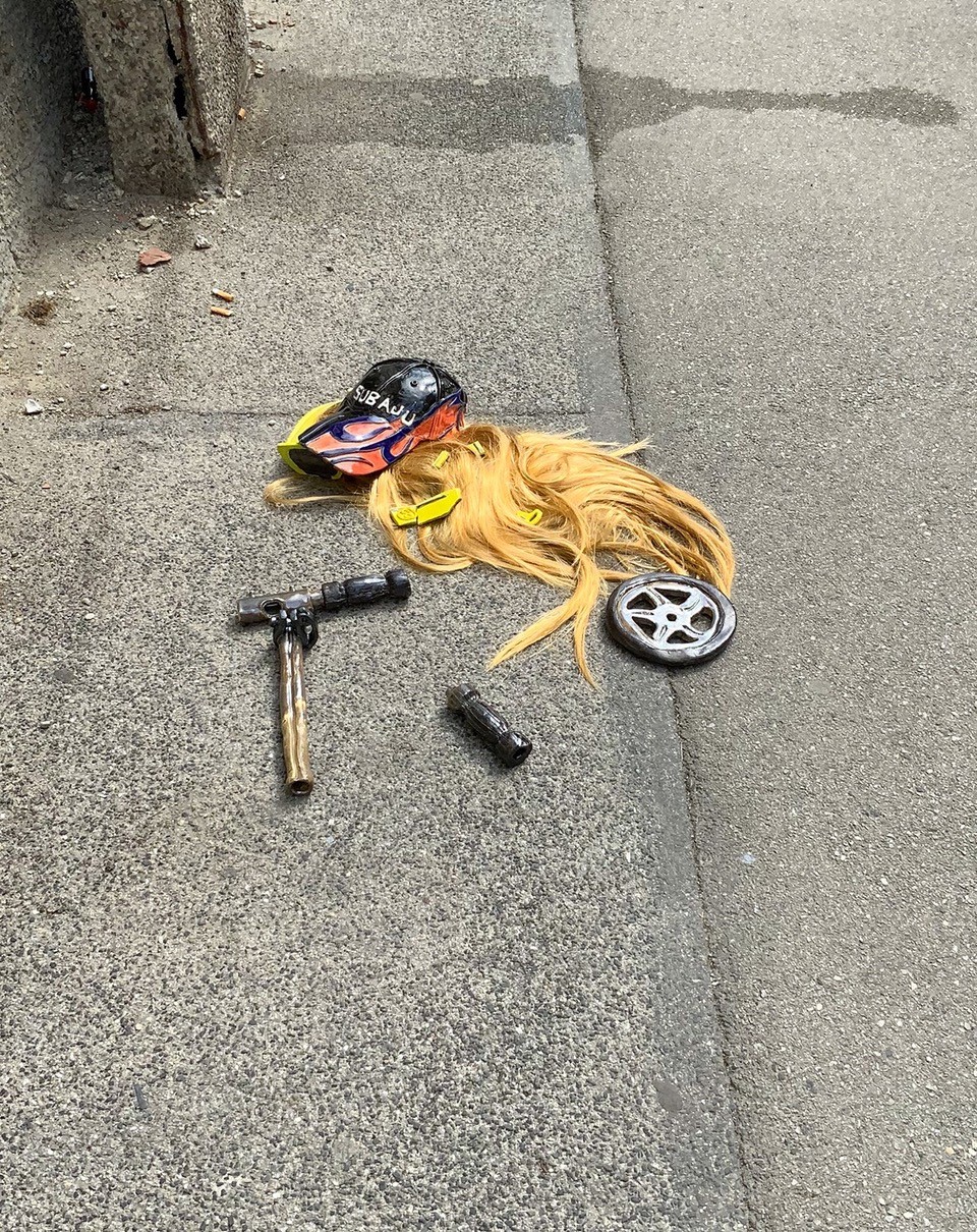 Cute babe fell of the scooter and broke their Gucci glasses. Uff. Ju Aichinger, stoneware and wig,2021.jpg