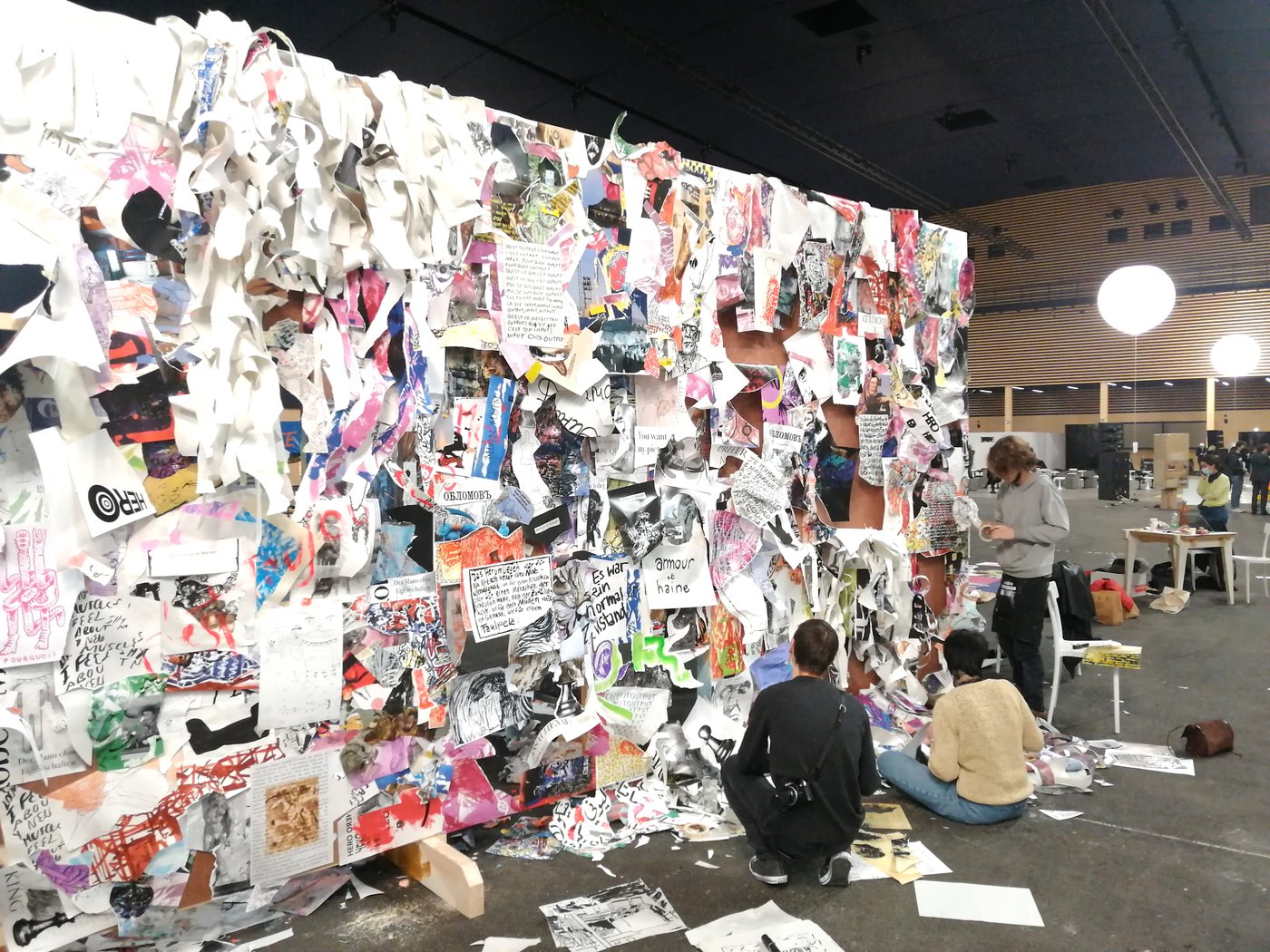 Students in front of a wall with notes and drawings